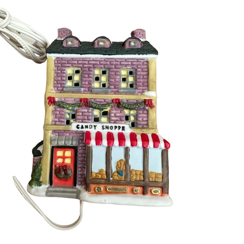 Trim a home light upβ Christmas Candy Shoppe Village building 1996